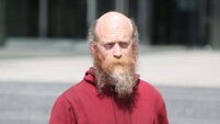 Judge orders arrest of activist who allegedly drove into immigration protesters