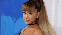Ariana Grande pays tribute to former drummer Aaron Spears following his death