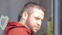 Man who torched garda car outside station 'wanted to be arrested', court told