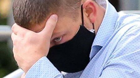 Swimming coach who filmed girls changing jailed for three years