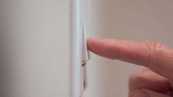 Husband claims wife has breached court undertaking by turning off immersion heater