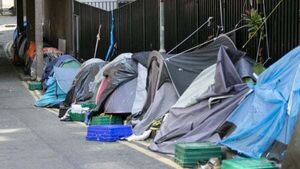 Government criticised for 'cynical' relocation of asylum seekers from Dublin city encampment