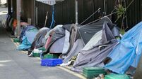 Government criticised for 'cynical' relocation of asylum seekers from Dublin city encampment