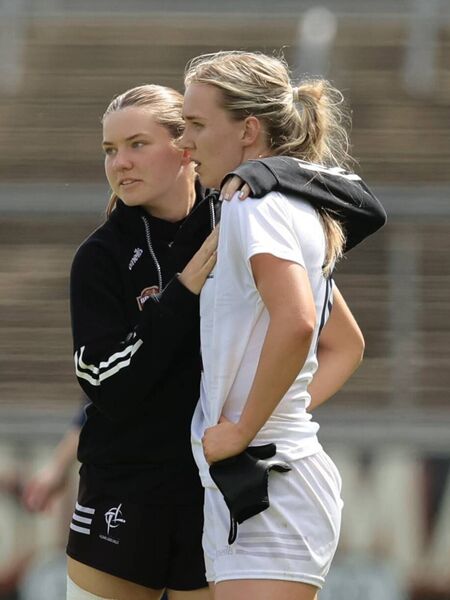 Ruth Sargent consoles Neasa Dooley after the final whistle Photo: Karl Gormley