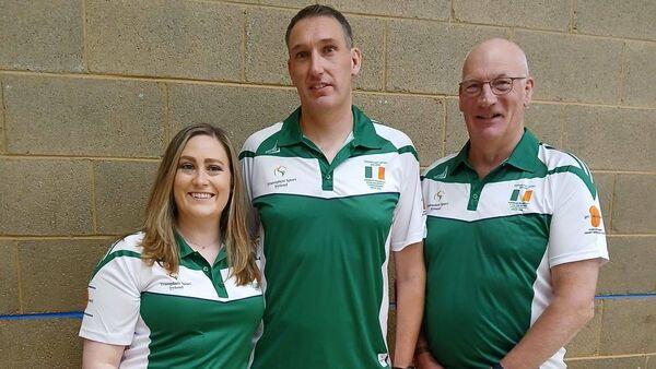 Robbie England from Naas, who plays badminton with Kilcullen Badminton Club, with his wife Gillian and dad David