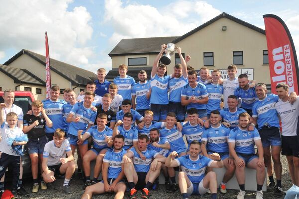 The Allenwood Team with the cup after their win over St Laurences in the 2024 Hanlon Concrete Senior Football Division 2 Final Photo: Martin Rowe 