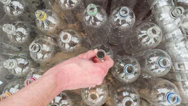 Commuters warned not to rifle through bins at train stations for cans and bottles