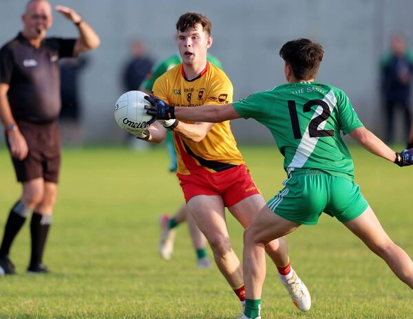 TJ Nolan carries the ball forward for St Laurences Photo: Sean Brilly TJ Nolan carries the ball forward for St Laurences Photo: Sean Brilly