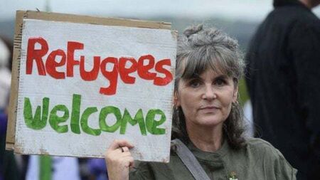 Trade unions lead rally ‘demanding action’ after nights of disorder in Belfast