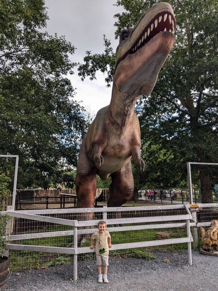 A young visitor to Jurassic Newpark dares to take a photo with the fearsome T-Rex! A young visitor to Jurassic Newpark dares to take a photo with the fearsome T-Rex!