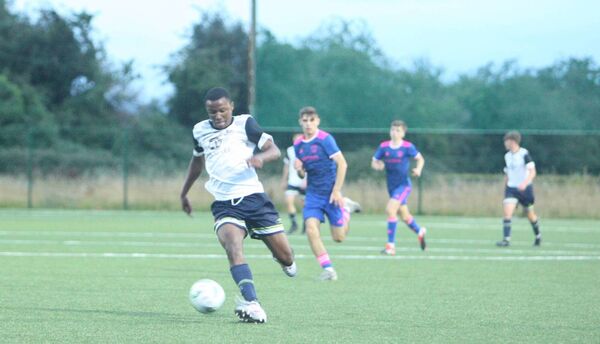 Vuyo Mosea breaks forward into the Cork City penalty area Vuyo Mosea breaks forward into the Cork City penalty area