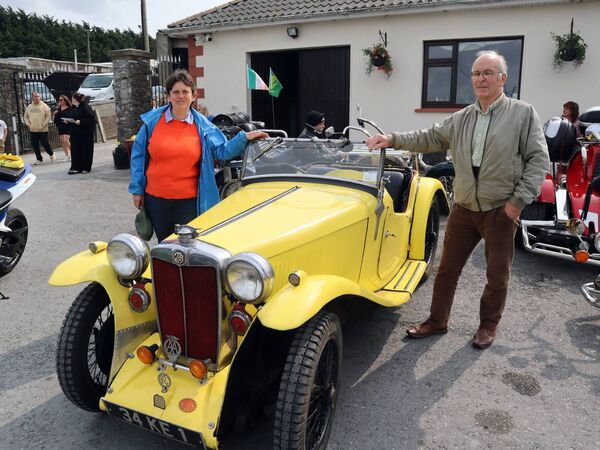 Simon Pallister and his daughter Holly. The MG he has had since 1968, when it required some TLC. The bonnet was in a field, the chassis two miles away. 