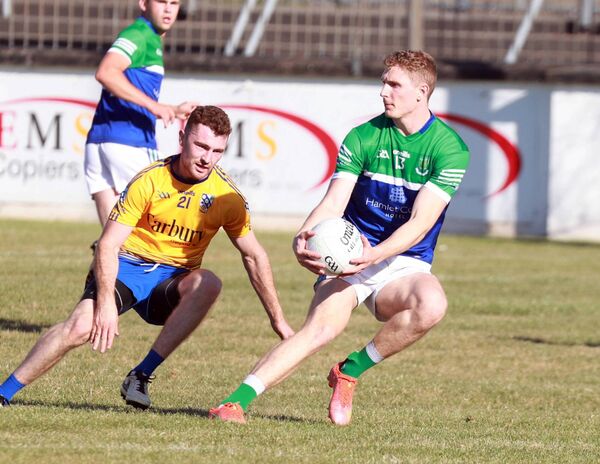 The local derby between Johnstownbridge and Carbury is always keenly contested Photo: Sean Brilly