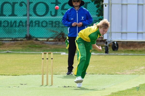 16-year-old Mattew Hodgson delivers with a wicket