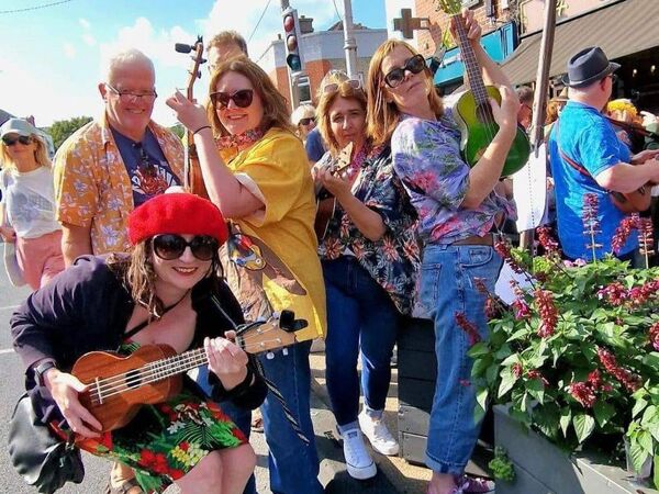 Enjoying the Big Ukulele Bus Busk!