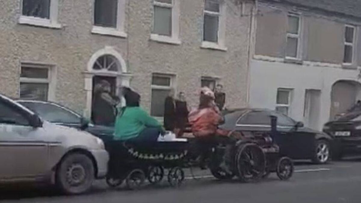 Driver charged with parade crash 