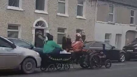 Driver charged with parade crash 