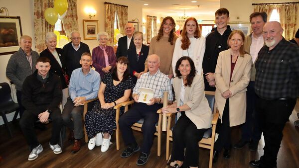 Paddy McGilligan with his Benemerenti medal and family members who were present for the award.