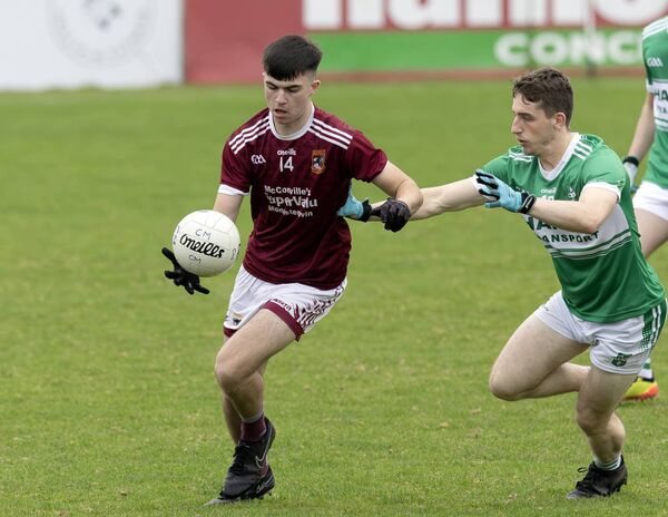 Ballykelly's Darragh Byrne and Castlemitchell's Ray Kavanagh Photo: Sean Brilly