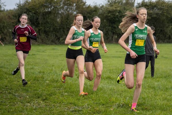 Rachael Keaney leads Hannah Cash and Eabha Brennan (all Newbridge) along with Caoimhe Fitzgerald (Crookstown-Millview) in the girls U16 Photo: Perri Williams