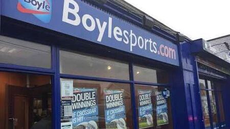 Woman armed with scissors alleged to have held up Kildare bookies