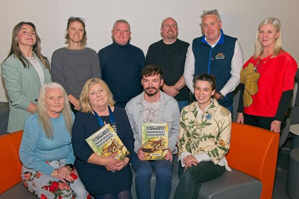 (standing) Marie Healy of Sláinte Care Healthy Communities with KCC, Jason Leigh of Empowering Communities CKLP, Cllrs. Mark Leigh and Brian Dooley, Eilish Langton of Creative Places Athy; (seated) Rose Doyle of Woodstock Castle Press and Chairperson of Athy West Urban, Cathaoirleach of the Athy Municipal District, Cllr. Aoife Breslin, artists Mark Durkan and Mary Jo Gilligan, pictured launching ‘Woodstock - The Book’ at Athy Library