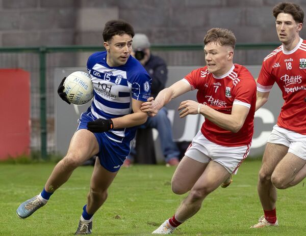 Naas's Neil Aherne and Athy's Colm Moran	Photo: Sean Brilly