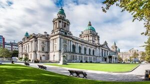 Sinn Féin employee resigns after damage to DUP portrait Sinn Féin employee resigns after damage to DUP portrait