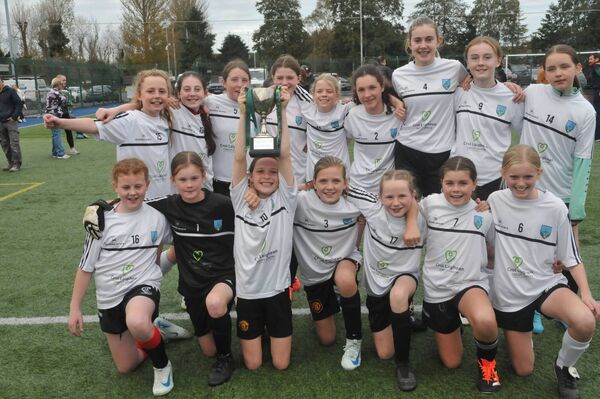 Scoil Bhríde, Clane team with the cup after their final win Photo: Martin Rowe Scoil Bhríde, Clane team with the cup after their final win Photo: Martin Rowe