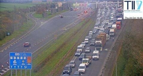 M1 traffic: Drivers face long delays after lorry overturns on motorway