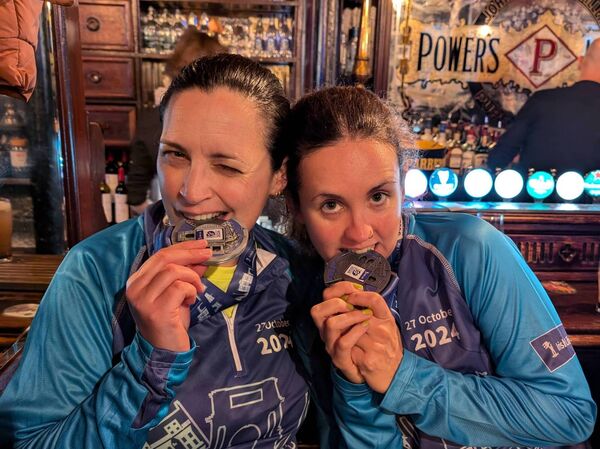 Thea and Niamh, cousins from Kildare, with their marathon medals, running for the IKA in memory of their aunt Mary from Clonmel Thea and Niamh, cousins from Kildare, with their marathon medals, running for the IKA in memory of their aunt Mary from Clonmel