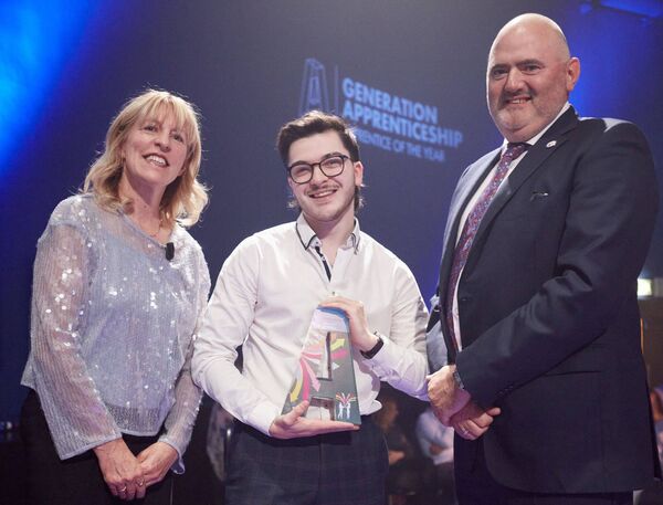 ICT award winner Jack Yeates with NAO Director Mary Liz Trant, and Barry Comerford