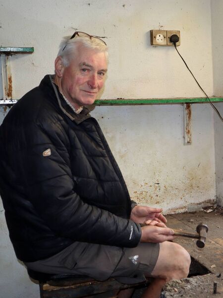 Ger at the bench he worked at for almost 50 years