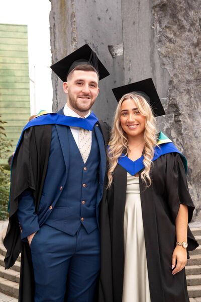 Oisin Hand (L) and Amy Price (R) from Kildare, are pictured together after graduating at South East Technological University in Carlow. Oisin graduated with a Bachelor of Arts in Sport Coaching &amp; Business Management (Football) and Amy graduated with a Bachelor of Arts in Professional Social Care Practice