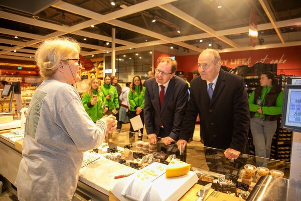 Tanaiste Micheal Martin and Minister James Lawless at the cheese counter in Dunnes Stores in Naas
