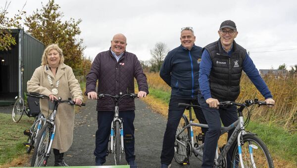 Aoife Breslin, Mark Wall, Brian Dooley and Syl Merrins test out the tandem bicycles.