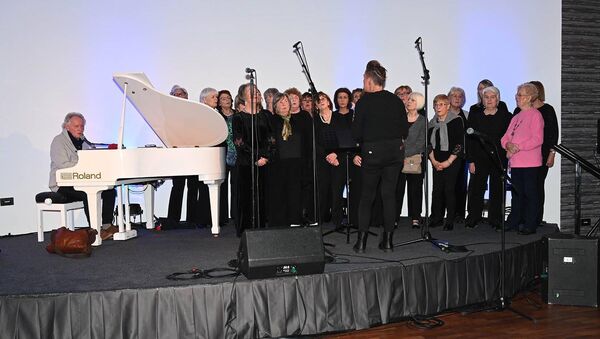 Phil Coulter with support from Eimear Cremman and the Suso Gospel Choir in Lawlors of Naas Phil Coulter with support from Eimear Cremman and the Suso Gospel Choir in Lawlors of Naas