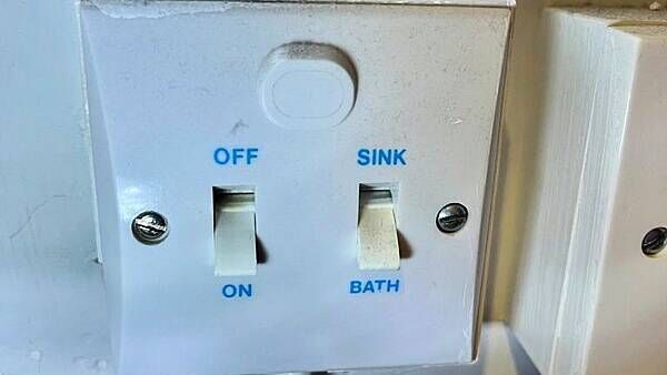 Warring couple in court over use of immersion switch