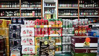 Pair armed with knives threaten staff at off-licence