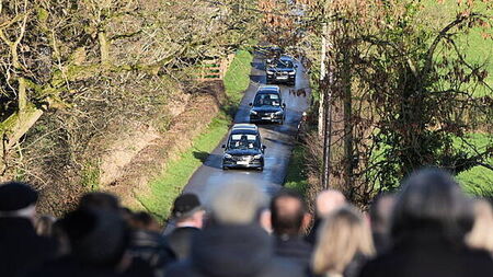 Community still in shock over deaths of father and son, funeral told
