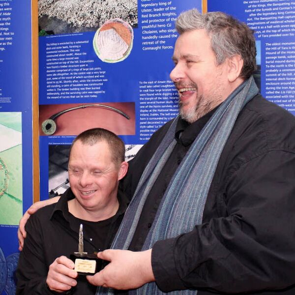 Mischa with Camphill resident Kevin Prendergast when accepting his Community Award in 2015