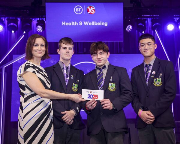 Therese Gunning, Legal Director at BT Ireland presents the 3rd place Senior Group Health and Wellbeing Category Award to Angelo Leonardo, Jack Boughton and Jakub Urbanczyk from St Paul's Secondary School, Monasterevin for the project 'Air Purifier' 