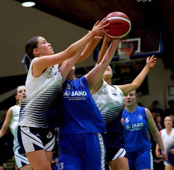  Naas Community College’s Maisie Ryan with Hazel O’Brien of Mercy Sligo in the Basketball Ireland All-Ireland U19 B Girls Schools Final at the National Basketball Arena in Dublin Photo: ©INPHO/Ryan Byrne