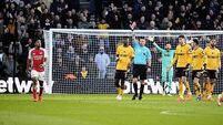 Arsenal overcome controversial Myles Lewis-Skelly red card to edge out Wolves