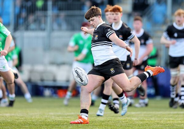Jody Flanagan of Newbridge College clears the ball Photo: ©INPHO/Andrew Conan