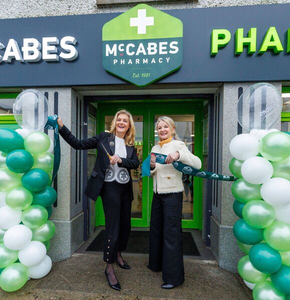 Cynthia Ní Mhurchú MEP cuts the ribbon with Sharon McCabe, CEO of McCabe's Pharmacy