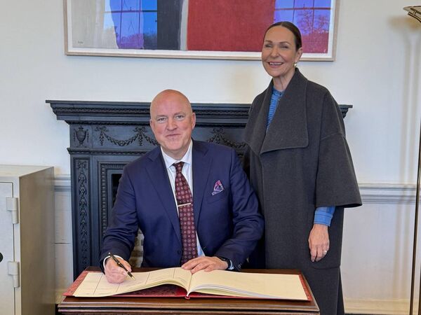 Aubrey McCarthy signing the Seanad book with good friend and supporter Jess Colivet