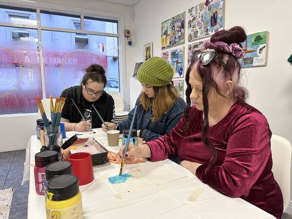 Beauty of Brigid at Arthouse, art workshop participants Megan, Rebecca and Johanna