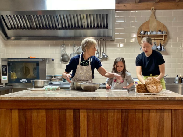 During the visit to Kalbarri Cookery School, the youngest of the French visitors Celeste Benbrahim takes a hands on part under the supervision of Siobhan Murphy.
