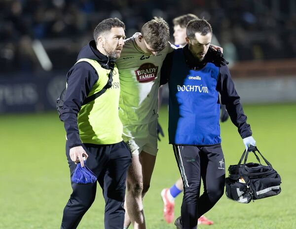 Colm Dalton is helped off the pitch during the win over Laois and he is one of the injury worries for manager Brian Flanagan Photos: Sean Brilly